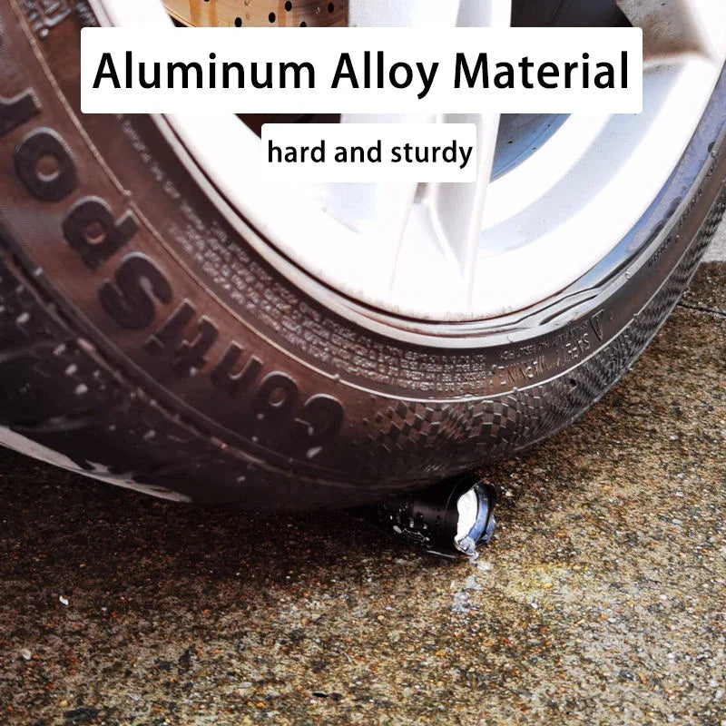 Close-up of car tire on aluminum alloy product showcasing durability on wet pavement