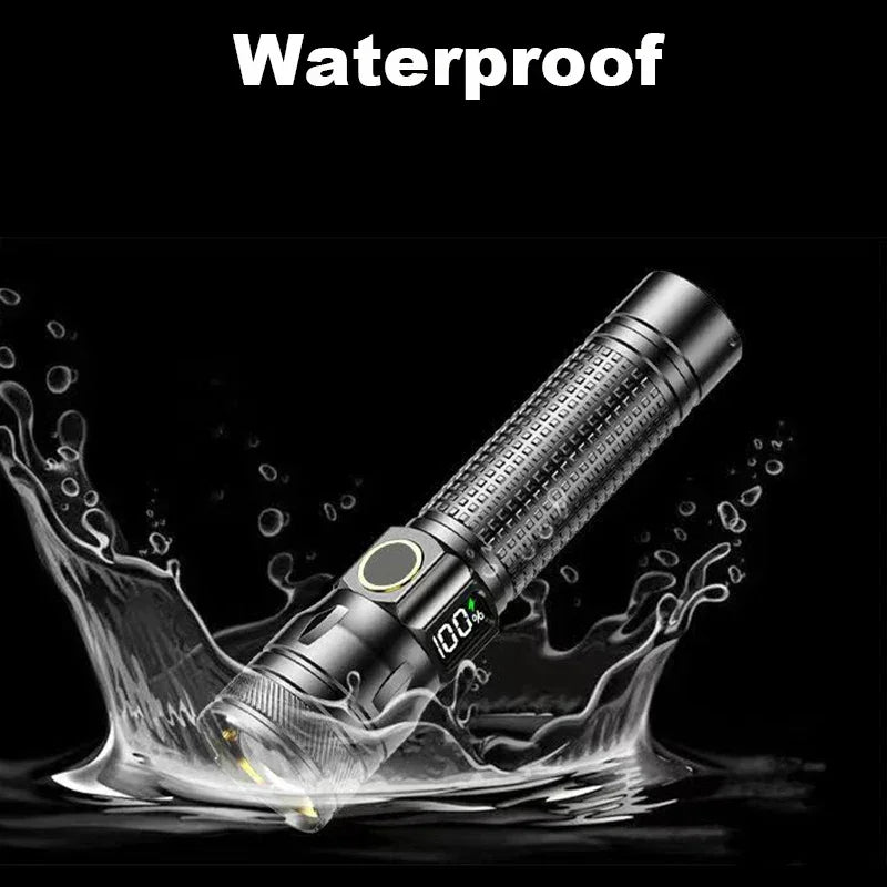 Voltaxa waterproof LED flashlight with battery display splashing in water