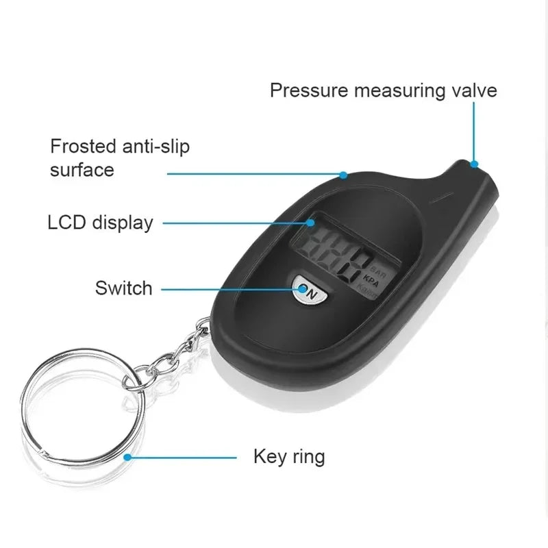 Digital tire pressure gauge keychain with LCD display, black anti-slip surface, and labeled parts.