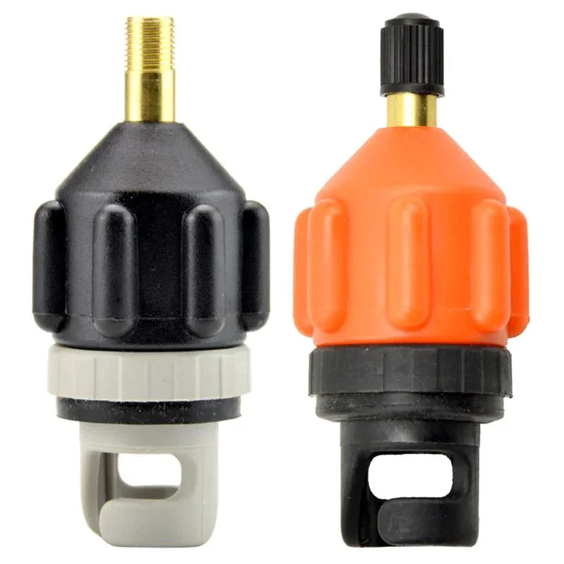 Two Voltaxa tire valve adapters, one black and one orange, on white background