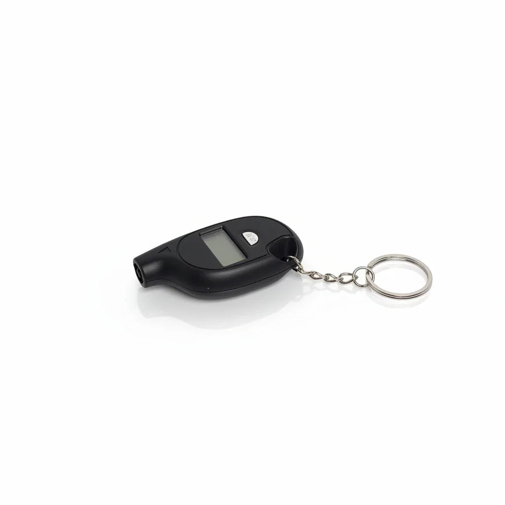Black digital keychain breathalyzer with LCD display on white background, Voltaxa accessory